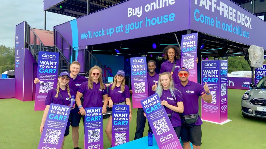 A team of promotional staff working at a festival activation.