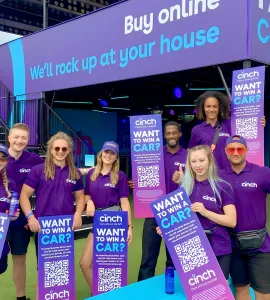 A team of promotional staff working at a festival activation.