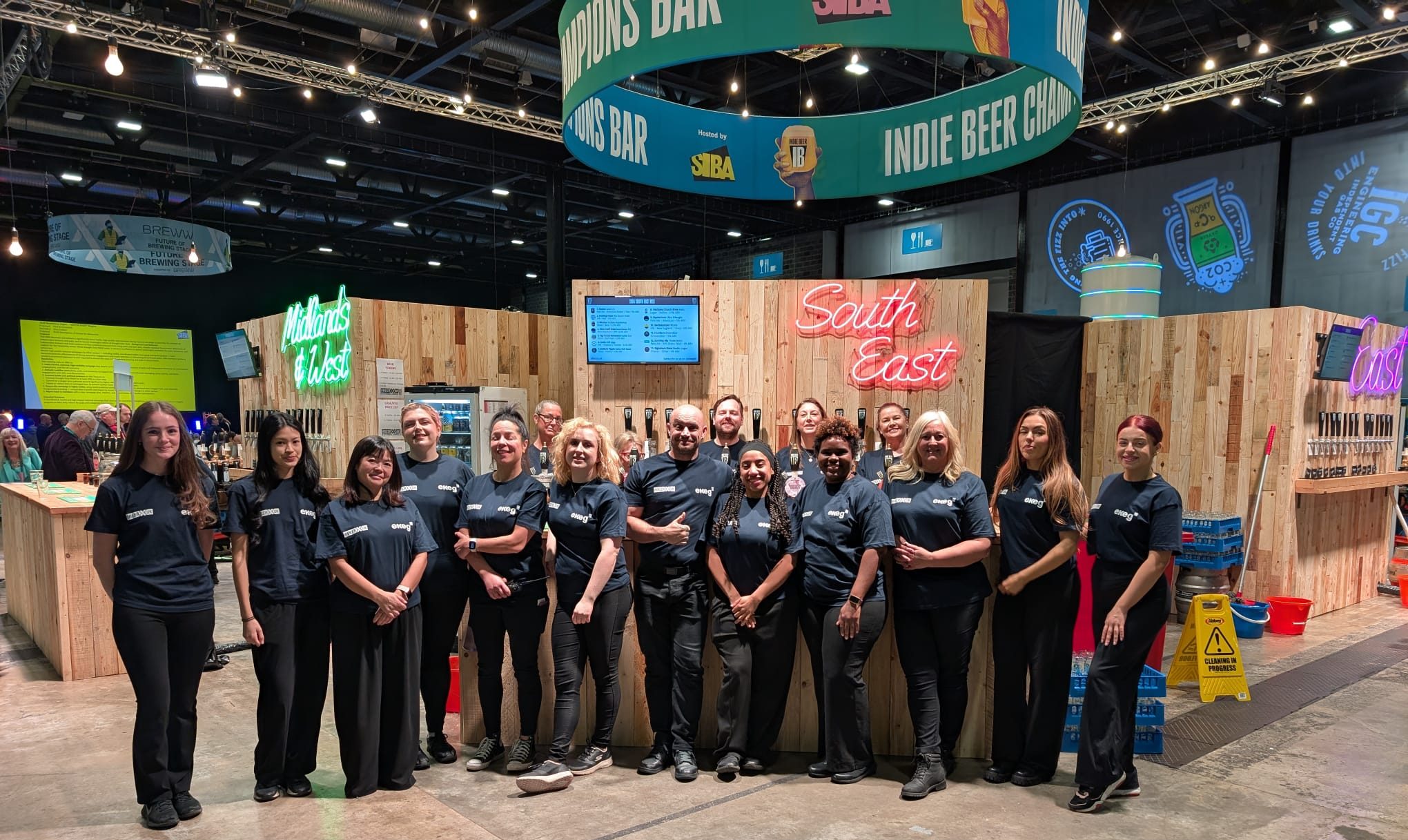 Exhibition staff Liverpool supporting a stand